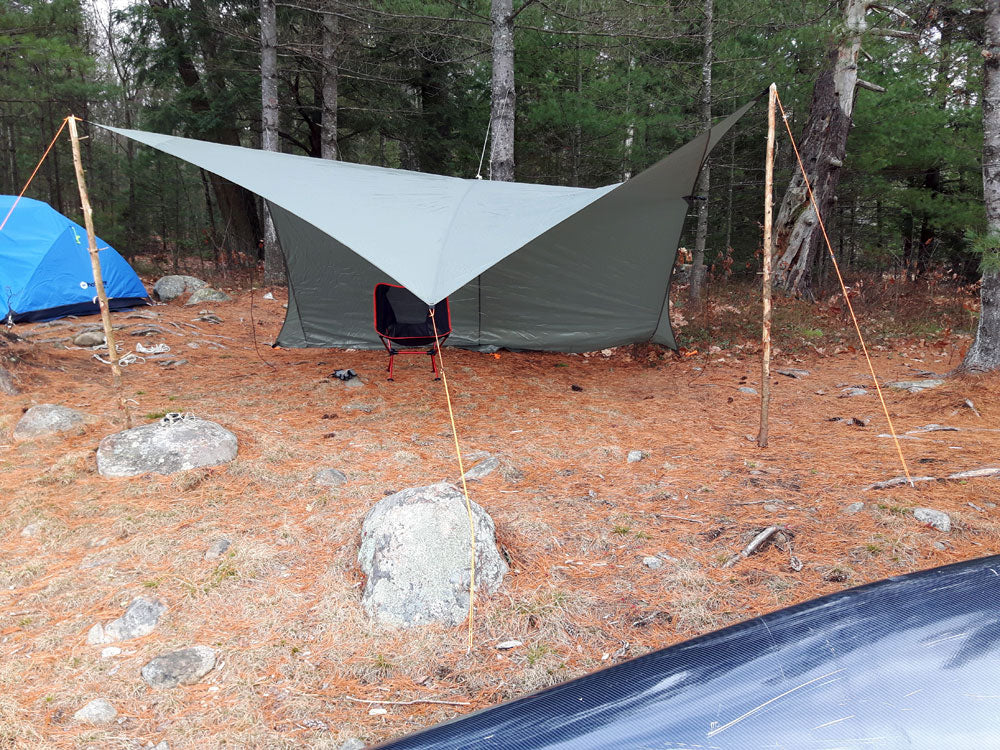 Lightweight rain outlet tarp